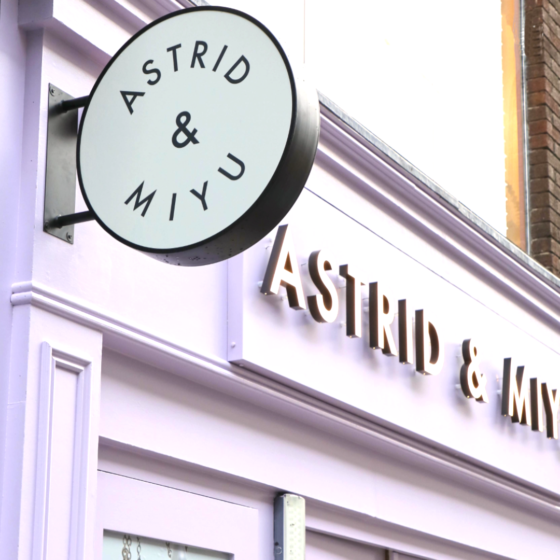 Wall mounted exterior roundel shop front sign, exterior facelift sign, Astrid & Miyu Dublin.