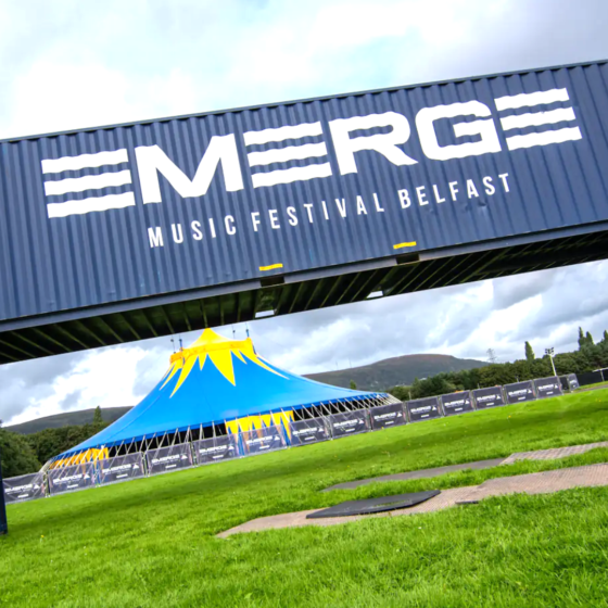 EMERGE MUSIC FESTIVAL logo printed onto large shipping container.