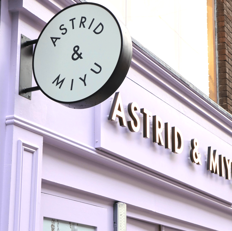 Wall mounted exterior roundel sign, exterior facelift sign, Astrid & Miyu Dublin.