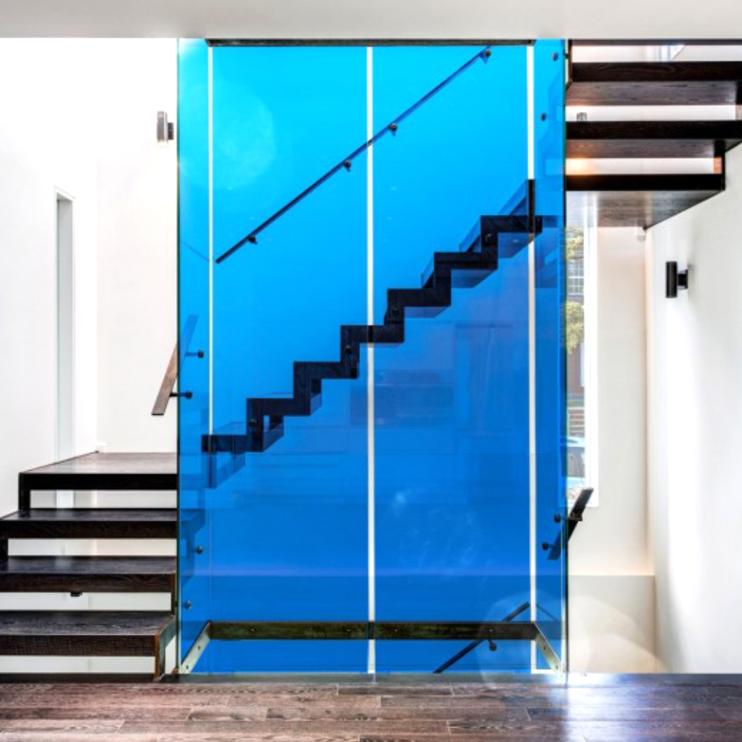 Blue coloured window film on glass partition